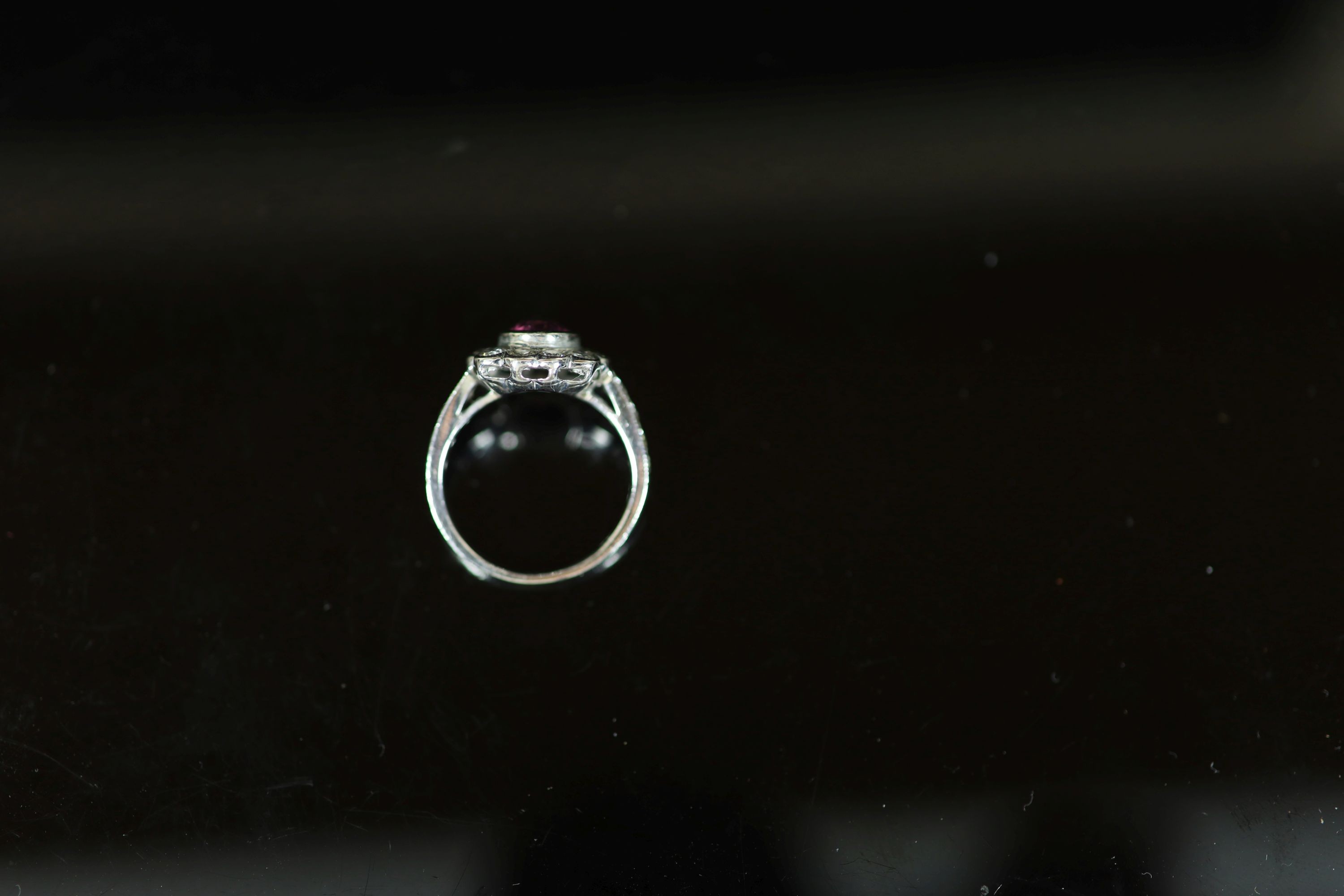 A modern 18ct white gold, pink sapphire and diamond cluster ring